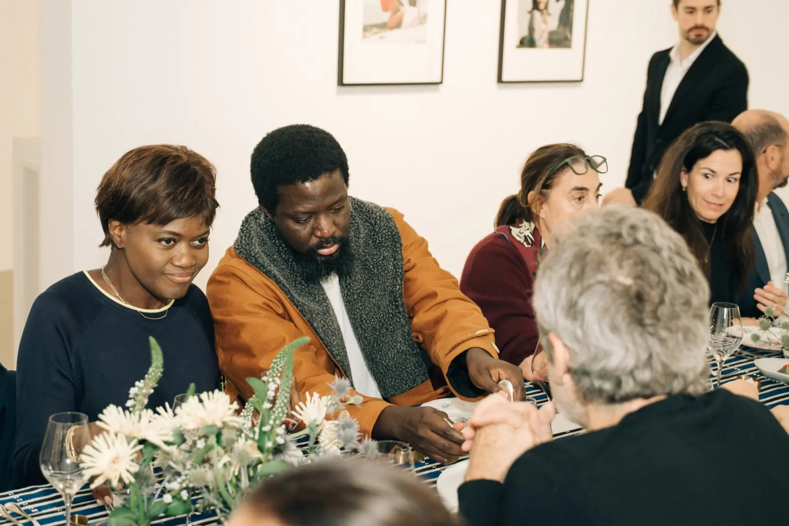 Guests eating at the long table